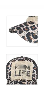 Close-up of leopard baseball cap with frayed fabric patch and Mom Life red lip print