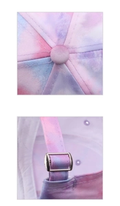 Detail view of the tie-dye cotton baseball cap with adjustable metal buckle and top button