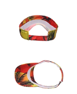 Detail of tropical sunset gradient visor hat featuring black palm tree silhouettes and sweatband
