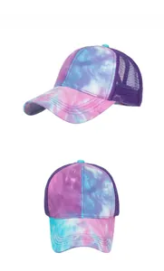 Detail of tie-dye baseball cap featuring breathable purple mesh and reinforced brim stitching