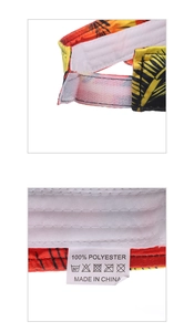 Detail view of tropical floral sun visor with adjustable velcro strap and care label
