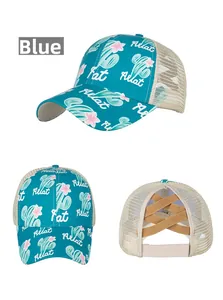 Detailed views of peacock blue ponytail baseball cap with cactus floral print and mesh back