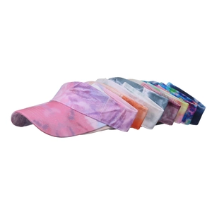 Summer tie-dye empty top sun hats with colorful gradient patterns and curved brims