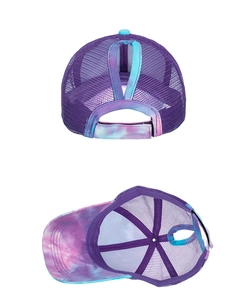 Detail of tie-dye baseball cap featuring a mesh back and a ponytail hole with velcro