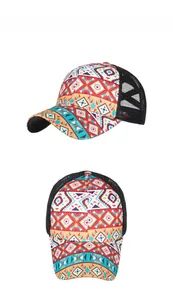 Detail of baseball cap with ethnic geometric print and black breathable mesh back panels