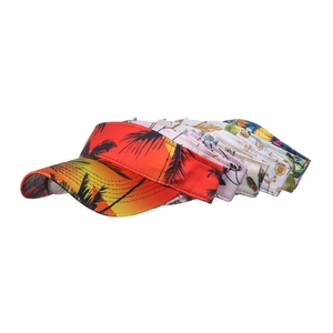 Collection of summer sun visors with vibrant tropical prints and adjustable open top