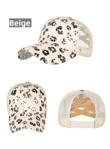 Detail of beige leopard print mesh baseball cap with criss-cross elastic ponytail hole