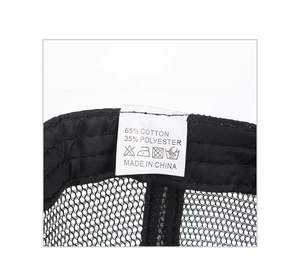Detailed macro view of the interior washing label and black mesh on baseball cap