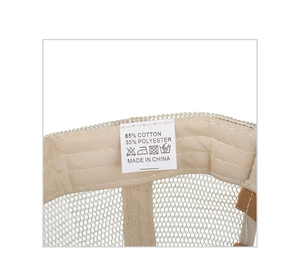 Detailed macro view of the interior sweatband and material composition label on the cap