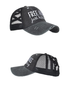 Close-up of distressed grey mesh baseball cap with Free Hugs embroidery and mesh back