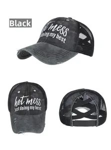 Detail of black ponycap with hot mess embroidery and elastic cross mesh back