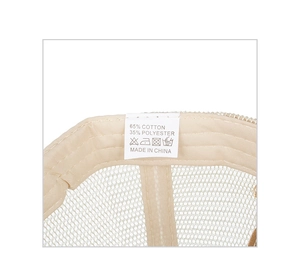 Detailed close-up showing breathable mesh and cotton-blend interior label of the cap