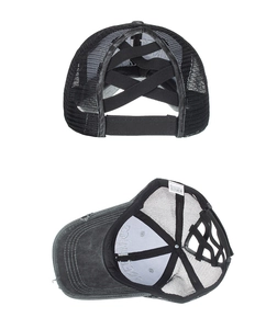Detail showing criss-cross elastic mesh for high ponytail and Free Hugs embroidery