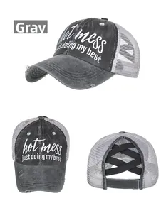 Detailed views of gray trucker hat with Hot Mess embroidery and criss-cross ponytail back