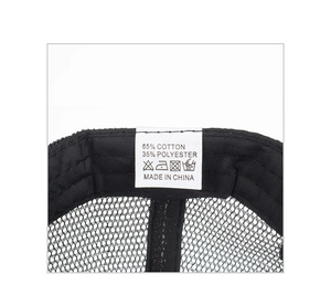 Detail view of cotton mesh cap interior featuring a white fabric care label and stitching