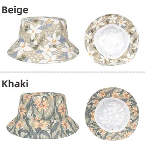 Detail view of beige and khaki floral cotton sun hats with wide brims and soft linings