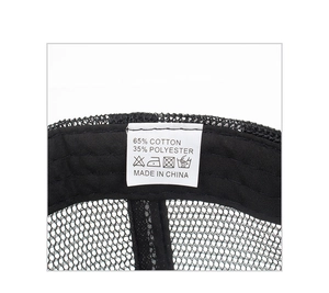 Detail shot of the inner care label showing 65% cotton and 35% polyester on a black mesh cap