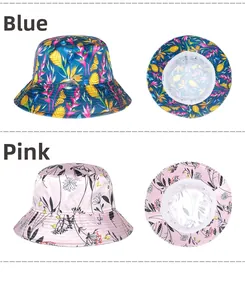 Detail view of blue tropical floral and pink sketched flower patterns on satin bucket hats