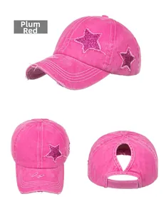 Detailed views of washed rose red ponytail baseball cap with distressed stars and back hole