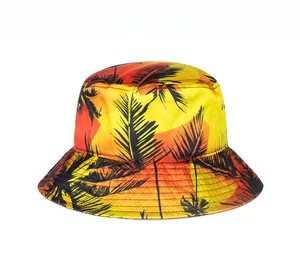 Close-up of tropical sunset print on bucket hat with palm tree silhouettes and orange sun