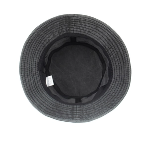 Detail of 100% cotton washed fabric and inner sweatband of the sun bucket hat