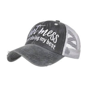 Distressed Hot Mess embroidered ponytail trucker hat with breathable mesh in dark grey