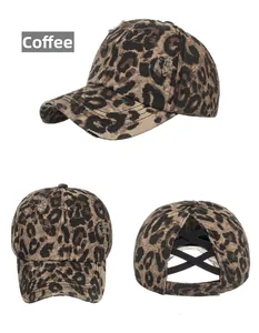 Detail view of coffee leopard print baseball cap with cross elastic bands for high pony