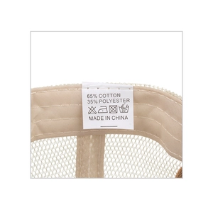 Detail view of the cotton polyester blend fabric and interior stitching on the baseball cap