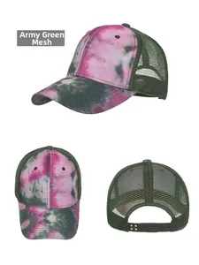 Detailed view of army green mesh back and adjustable snap closure on tie-dye trucker hat