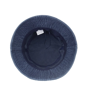 Navy blue cotton bucket hat interior view with adjustable strap and breathable sweatband