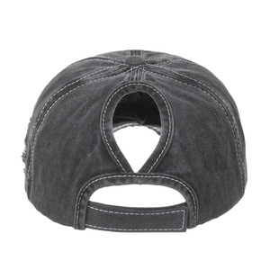 Washed dark gray denim ponytail baseball cap with a teardrop cutout and velcro closure