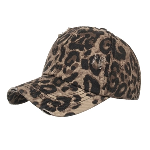 Distressed leopard print baseball cap in brown and black cotton twill with frayed edges