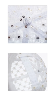 Detail of white mesh lace baseball cap featuring gold sequins and adjustable snapback