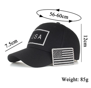 Detailed view of black baseball cap showing size dimensions 56-60cm and USA patch design