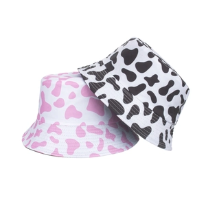 Cow print sun protection bucket hats in pink and black patterns for women