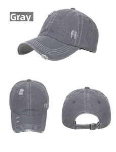 Three-view shot of grey washed denim baseball cap with distressed holes and metal buckle