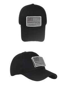Detail view of black tactical baseball cap with monochrome American flag embroidery patch