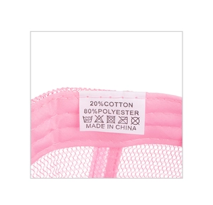 Detail of the internal wash label showing 80% polyester and 20% cotton material on pink hat
