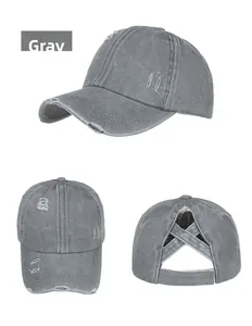Detail view of washed grey cotton ponytail baseball cap with elastic criss cross back design
