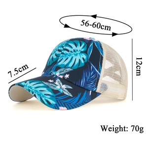 Navy blue baseball cap with tropical leaf print and breathable cream mesh back