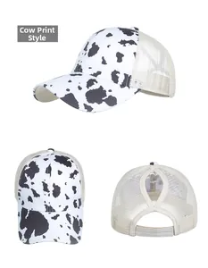 Detailed view of the cow print ponytail baseball cap with breathable mesh and rear opening