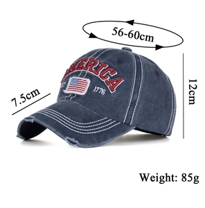 Detail of washed navy cotton baseball cap with AMERICA embroidery and US flag patch