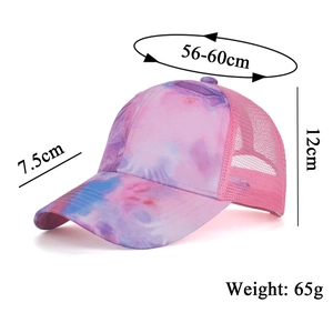 Pink and purple tie-dye trucker hat with breathable mesh and adjustable baseball cap fit
