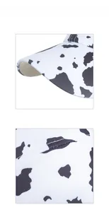 Close-up of double-stitched curved brim on cow print baseball cap with fabric texture
