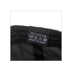 Detail view of 100 percent cotton washed ponytail baseball cap inner lining and care label