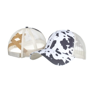 Women's cow print baseball cap with criss-cross elastic bands for ponytail hairstyles