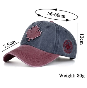 Detail view of cotton baseball cap showing side Canada maple leaf embroidery and dimensions