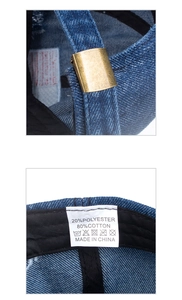 Dettaglio della fibbia in metallo e etichetta interna sul cappello in denim blu