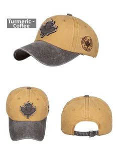 Detail view of washed cotton baseball cap with maple leaf patch and metal buckle