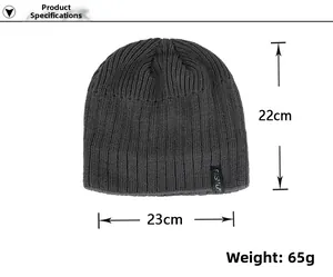 Close-up of dark grey knitted beanie showing product dimensions and fashion label detail